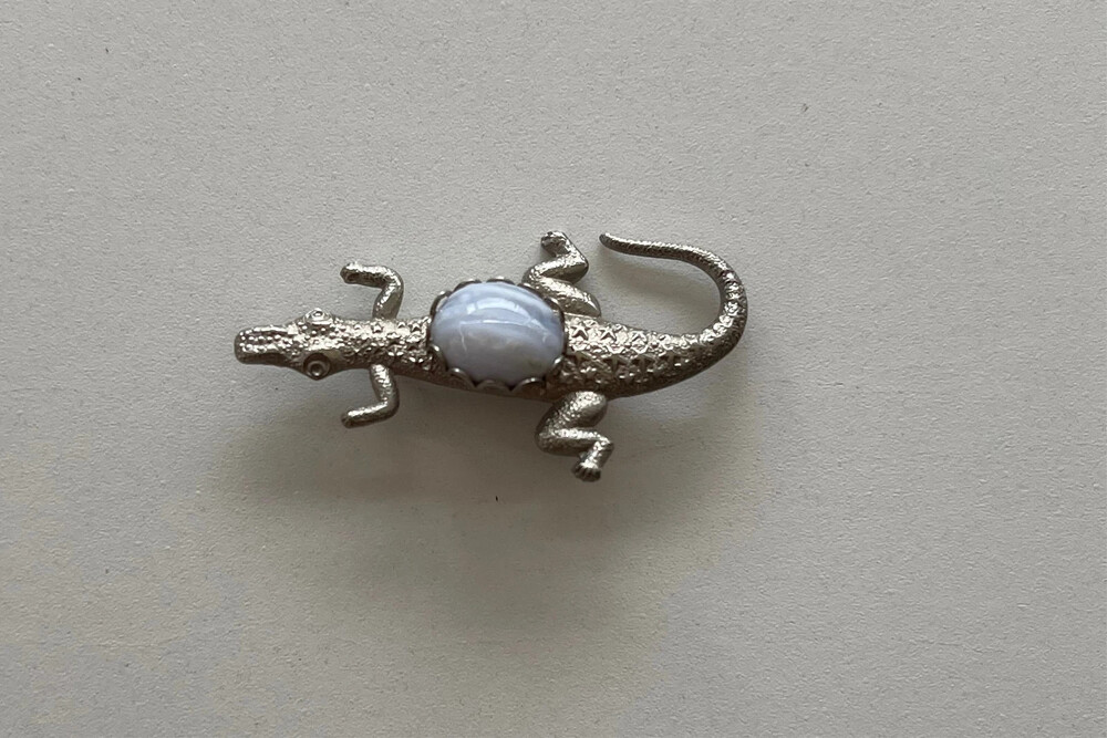 silver toned alligator brooch with domed blue Blue Lace Agate central stone